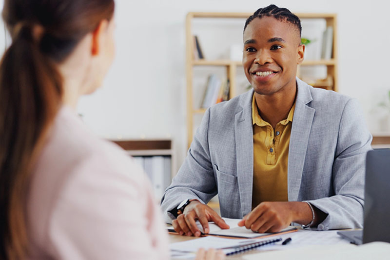 Business, employees and black man in consultation, planning and